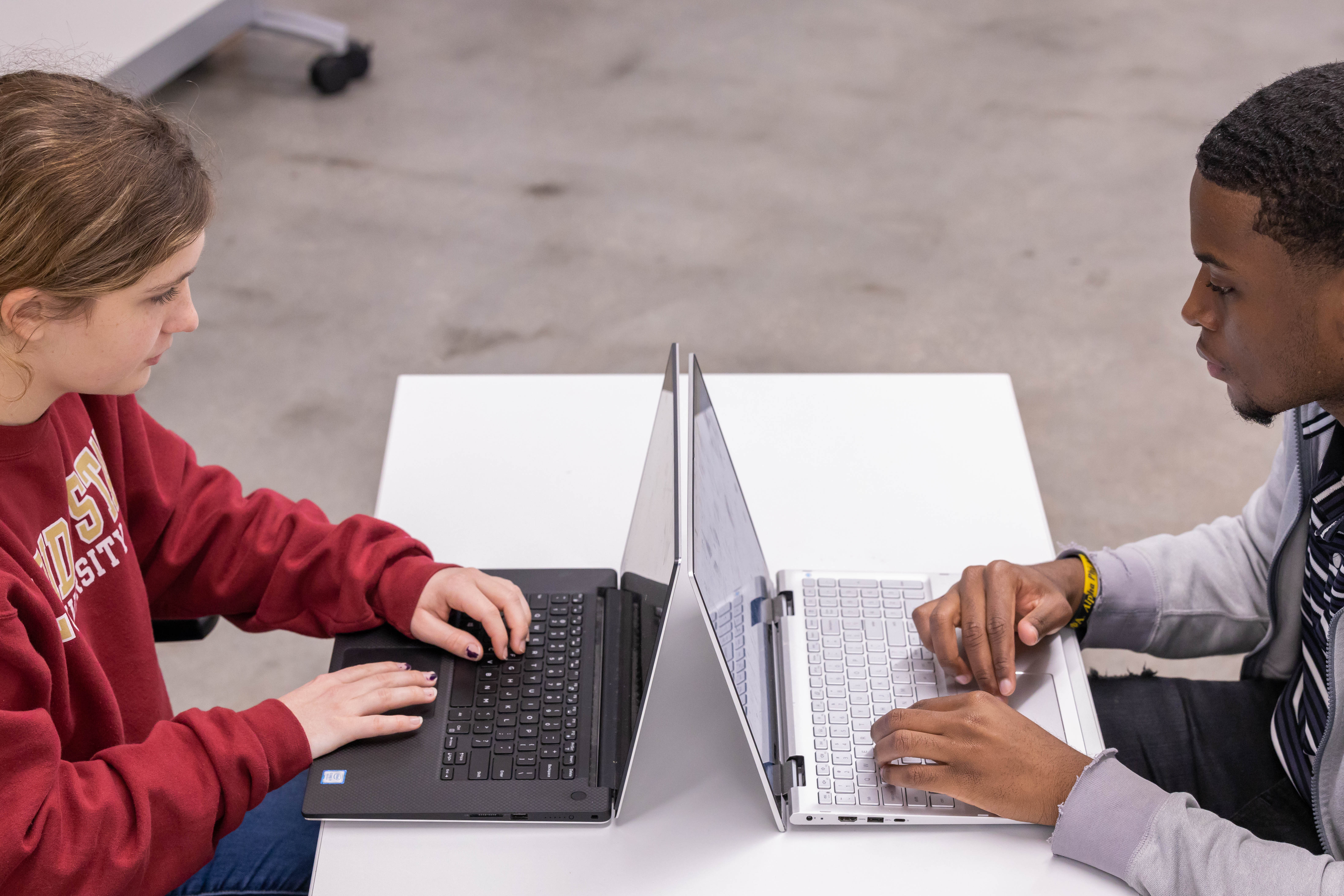Students studying on laptops