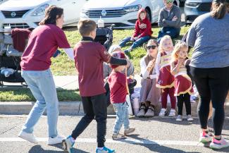 ITS Staff at parade handing out swag