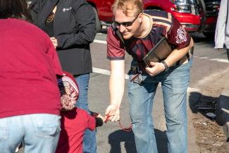 ITS Staff at parade handing out swag