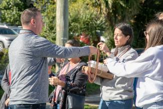 ITS Staff at parade handing out swag