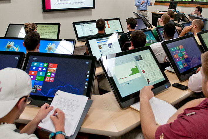 View of classroom of students on desktop computers.
